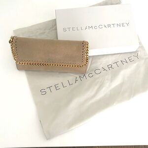 STELLA MCCARTNEY 
Falabella Flap Continental Wallet in Clotted Cream